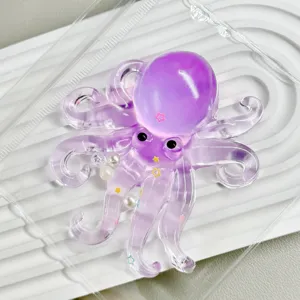 Translucent purple octopus squeeze toy with glitter stars decompression toy SKU view