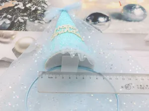 Sweet blue tulle birthday party headband, cute cone hat detail, perfect for little girls.