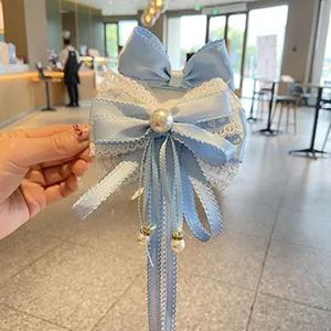 Dulce pinza de pelo con lazo azul estilo Lolita japonés con encaje y perlas para niñas.