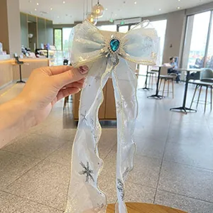 Kinder blaue Schneeflocke Schleife Haarklammer mit langen Bändern und Kristallstein.