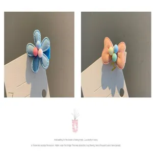 Süße Kinder Haarklammern Set mit blauer Blume und rosafarbener Schleife für Mädchen.