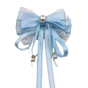 Dulce pinza de pelo de lazo azul claro Lolita japonesa con encaje blanco y perlas para niñas.