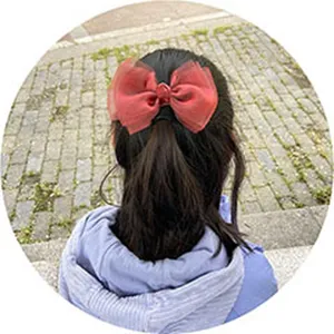 Red mesh bow hair clip, large sheer hair accessory with clip for sweet girls and kids style.