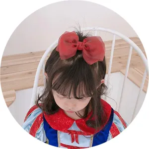 Children's large red organza bow hair clip, sweet princess hair accessory for little girls.