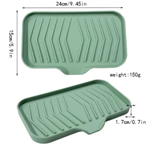 Portasapone in silicone verde con design di drenaggio, tappetino antiscivolo per bagno.