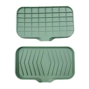 Portasapone in silicone verde con design di scarico, supporto per sapone antiscivolo per bagno.