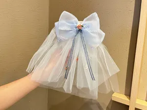 Children blue mesh bow hair clip veil, elegant princess flower girl hair accessory.