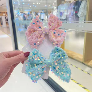 Cute velvet sequin bow hair clips set for young girls, sparkly side hair accessories.