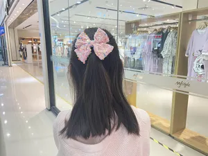 Kids pink velvet sequin bow hair clip, cute glitter hair accessory for girls daily wear.