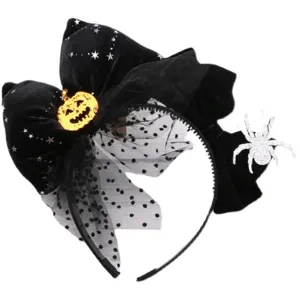 Cute Halloween black velvet bow headband with shiny pumpkin charm and spider decoration.