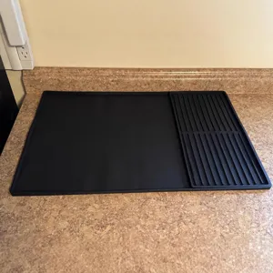 Alfombrilla de café de silicona negra y esterilla de drenaje para encimeras.