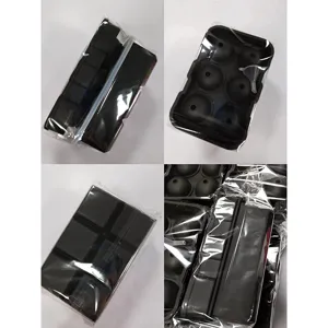 Detailed view of black silicone 6-cavity ice ball maker and square ice cube mold set.
