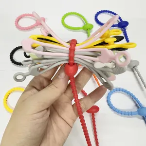 Bridas de silicona de colores, organizadores de cables flexibles y correas prácticas.