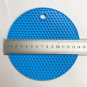 Silicone honeycomb trivet detail view showing precise dimensions and durable material texture.