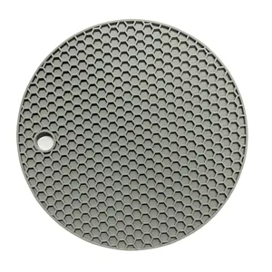 Round silicone honeycomb hot pad heat insulation mat for dining table kitchen bowl and cup.