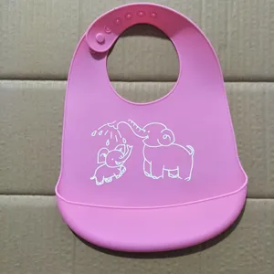 Pink silicone baby bib with pocket and cute elephant print, waterproof toddler feeding bib.