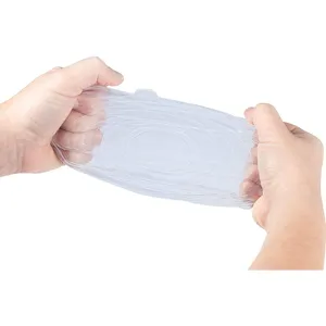 Reusable silicone stretch lids for food storage, transparent bowl covers with high elasticity.