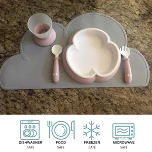 Silicone baby tableware set with cloud placemat, divided plate, cup, fork and spoon.