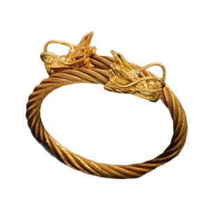 Bracciale rigido uomo in acciaio inossidabile placcato oro 18K con doppia testa di drago.