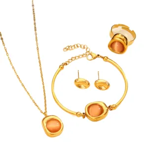 Exquisite stainless steel gold plated jewelry set with necklace bracelet earrings and ring.
