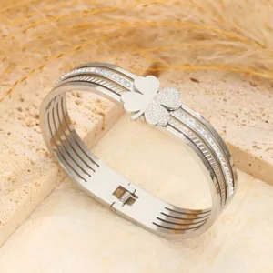 Stainless steel four leaf clover cuff bracelet with sparkling rhinestones for women jewelry.
