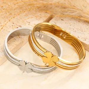 Exquisite multi-layer clover titanium steel bracelet with sparkling rhinestones for women.