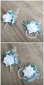 Artificial white rose wrist flower and boutonniere set for rustic wedding party decor.