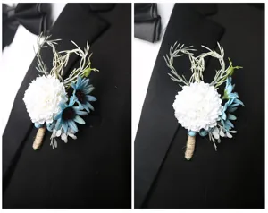 Wedding groom boutonniere detail shot, artificial white and blue floral corsage pin for men.