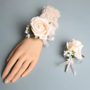 Wedding wrist corsage and boutonniere set champagne rose with silver ribbon for bride.