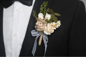 Elegant artificial rose flower boutonniere wedding groom corsage for formal business meeting.