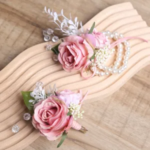 Set corsage e fiore da polso in rosa artificiale con perle per matrimonio ed eventi.