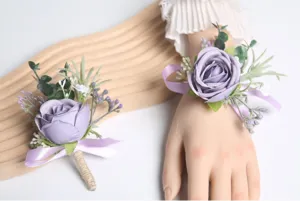 Elegant purple artificial rose wedding boutonniere and wrist corsage set for party decor.