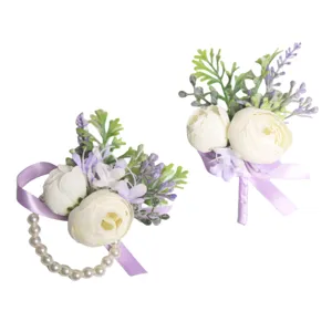 Wedding wrist corsage and boutonniere set with white flowers purple lavender and pearl bracelet.