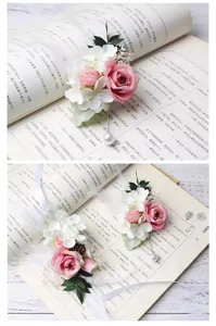 Detail shot of romantic pink rose corsage and wrist flower with pearls for wedding decoration.
