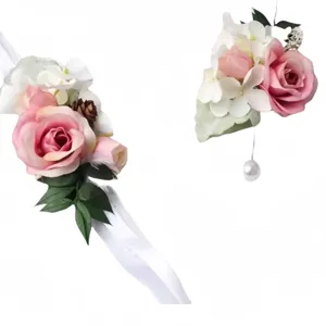 Romantic pink rose wedding wrist flower and boutonniere set with white ribbon and pine cones