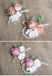 Handmade artificial rose wrist corsage and boutonniere detail, wedding floral accessory.