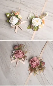 Detailed close-up view of artificial rose wedding wrist corsage and groom boutonnieres.