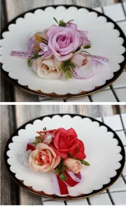 Nahaufnahme Detail künstliche Rosen Handgelenk Corsage floral Accessoire mit Band Hochzeit