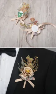 Korean style wedding groom boutonniere with champagne ribbon and artificial rose flower detail.