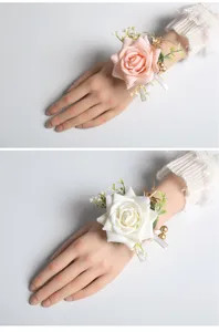 Artificial rose wrist corsage for wedding bridal party, elegant floral bracelet accessory.