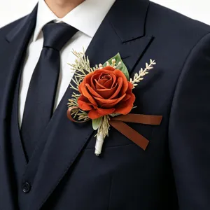 Elegant rust-orange artificial rose boutonniere brooch for wedding groom and suit accessories.