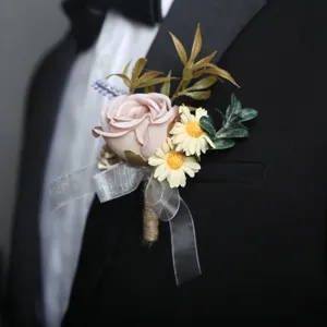 Elegant artificial rose boutonniere for wedding groom groomsmen business event suit decoration.