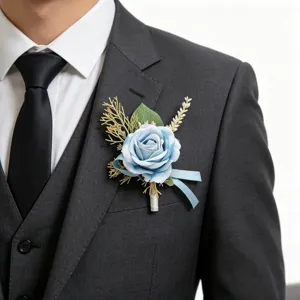 Light blue rose boutonniere wedding groom suit accessory decorative floral pin detail.