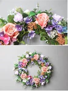 Detailansicht des künstlichen Blumenkranzes mit Nahaufnahme von Rosen und Hortensiend.