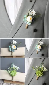 Detail view of handmade wedding boutonniere with artificial flowers and green leaves for groom suit.