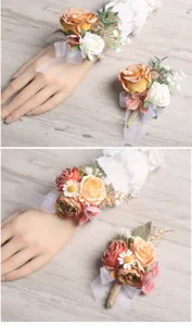 Close-up detail of artificial orange and white rose wrist corsage and matching wedding boutonniere.