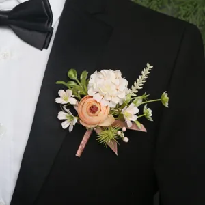 Wedding floral boutonniere detail shot, elegant fabric flower suit accessory for groom.