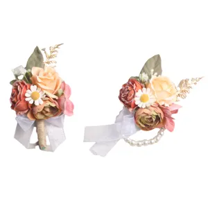 Orange artificial flower boutonniere and wrist corsage set for wedding party decor.