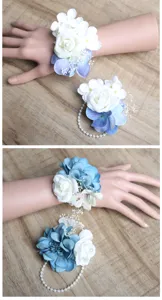 Blue and white artificial flower wrist corsage set with pearl bracelet for wedding.