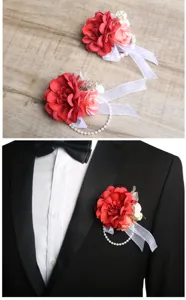 Wedding artificial flower corsage and wrist flower set with white ribbon and pearl chain decor.